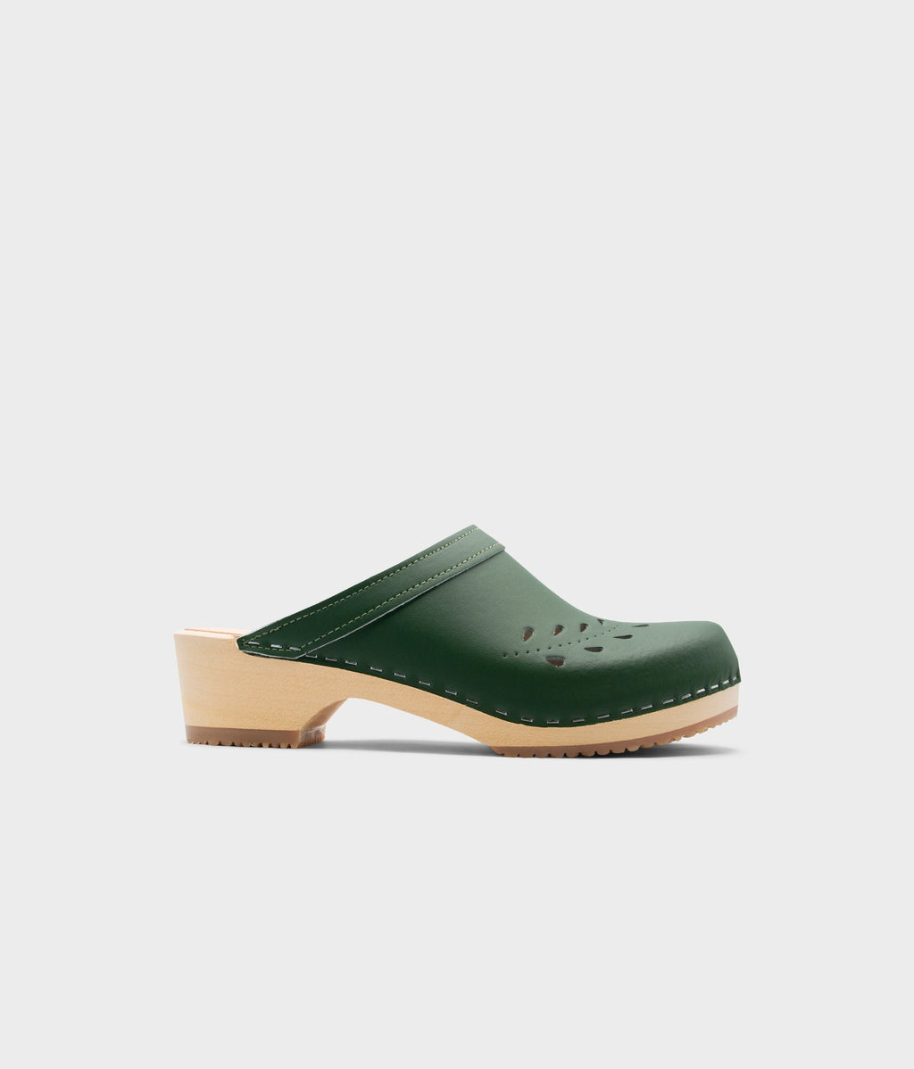 Single maroon clog shoe on a light gray background