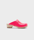 Pink clog shoe on a white background