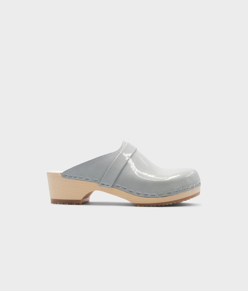 Light gray clog shoe on a white background
