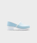 Light blue clogs on a white background