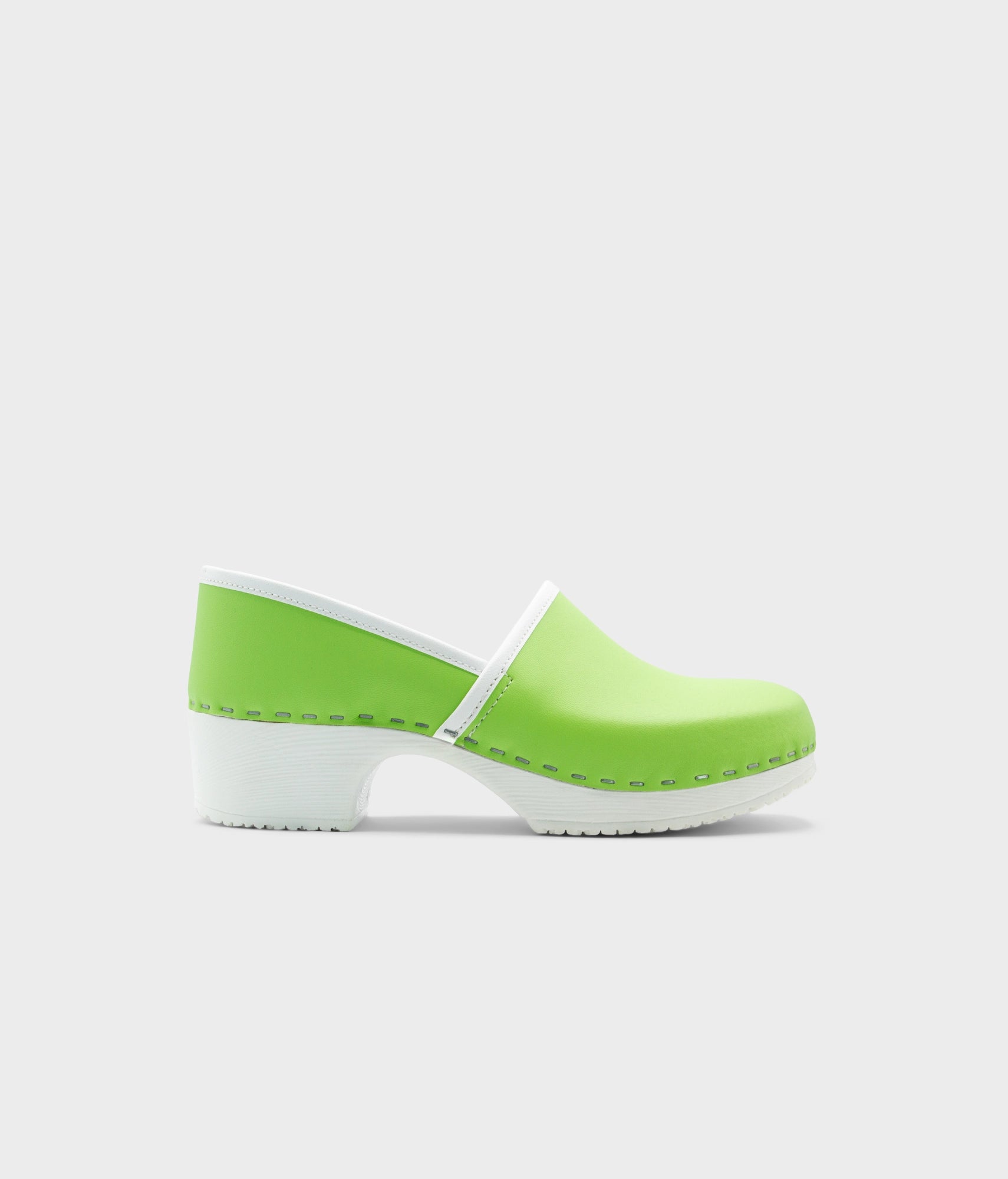 Green clog shoe on a white background