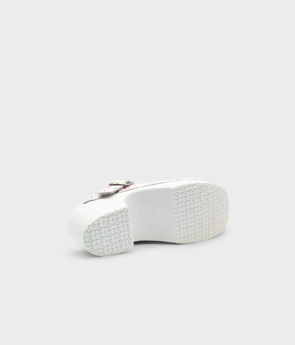 White sneaker sole on a light gray background