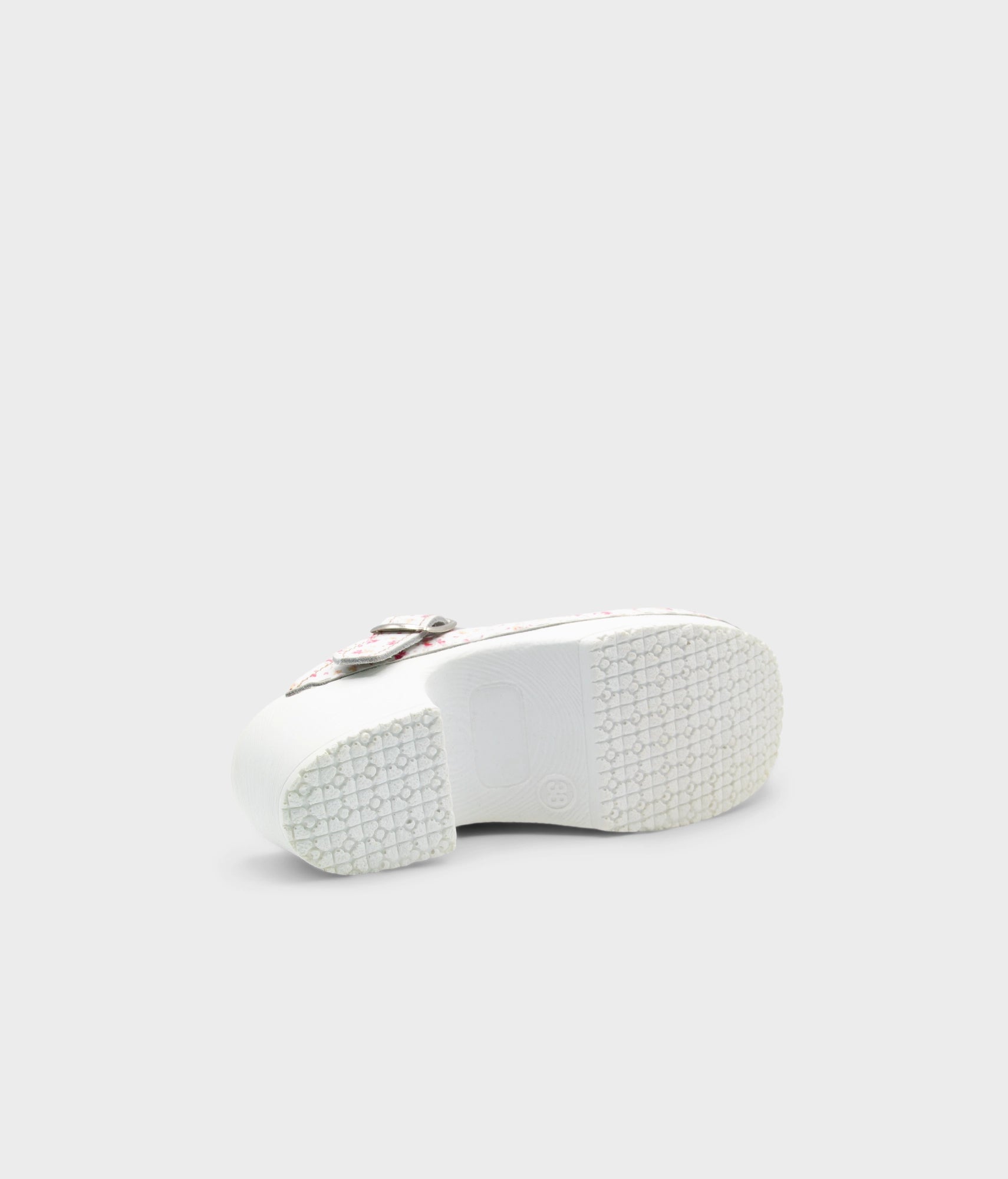 White sneaker sole on a light gray background
