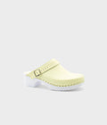 Light yellow clog shoe on a white background