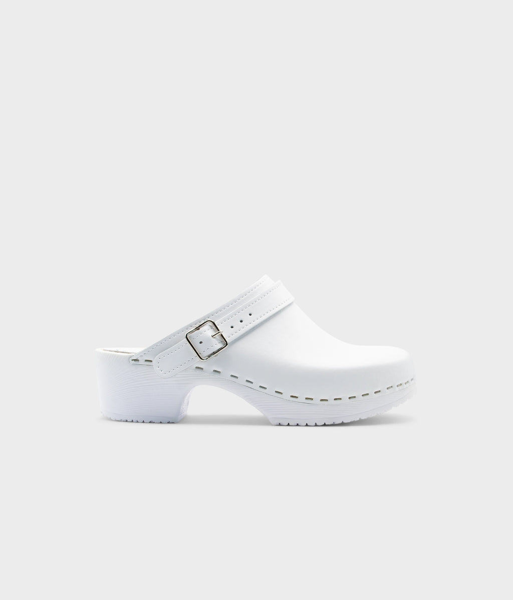 White clog shoe on a light gray background