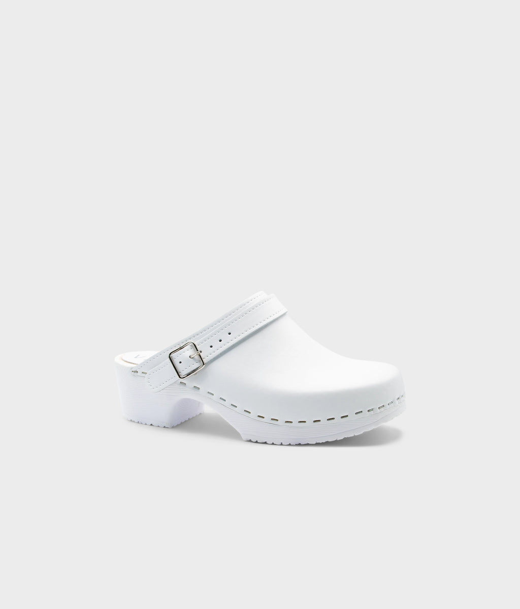 White clog shoe on a light gray background