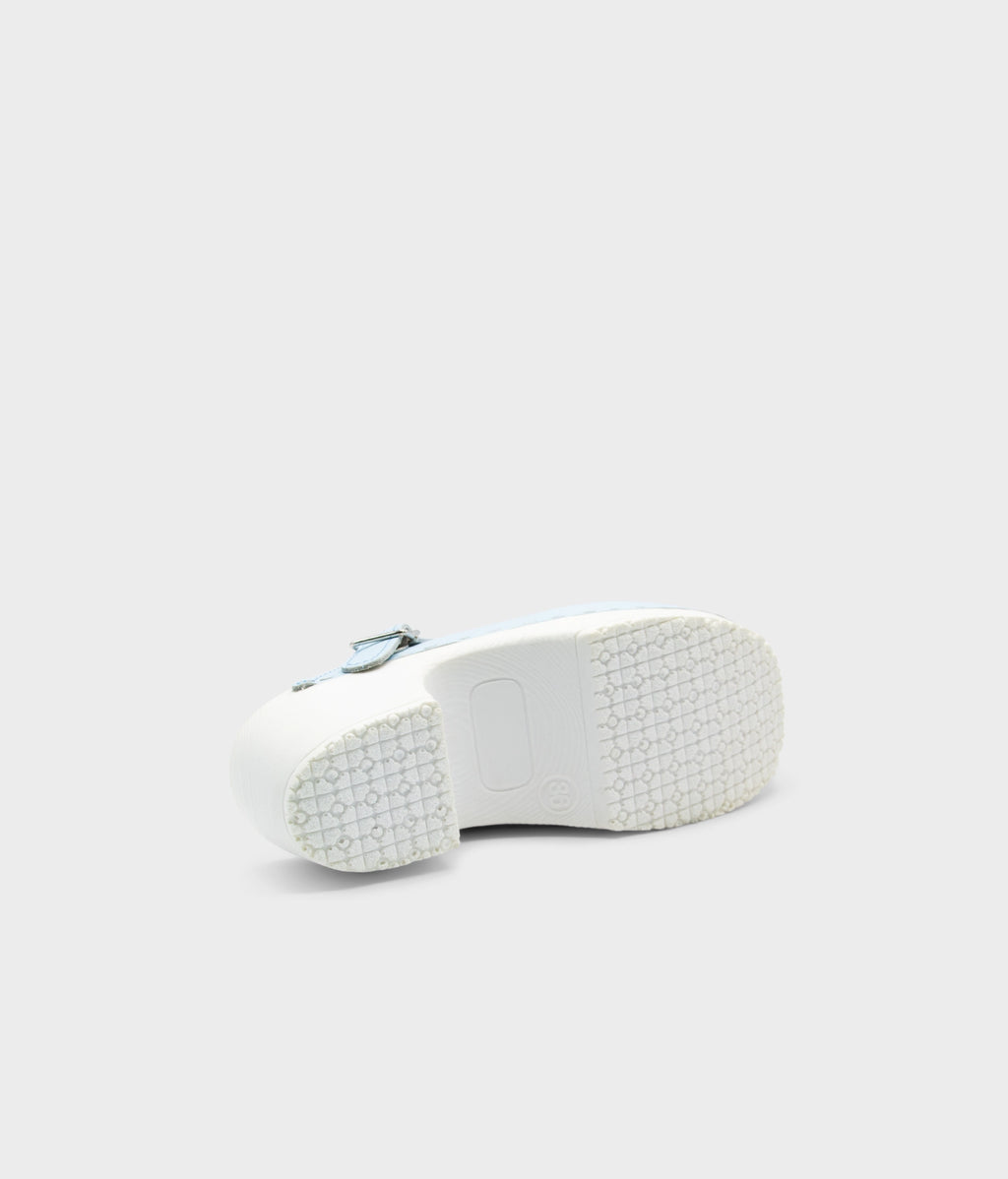 White sneaker sole on a light gray background