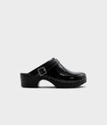 Black clog shoe with a strap on a light gray background