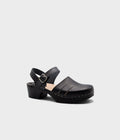 Black clog shoe on a white background