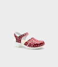 Red polka dot clog shoe on a light gray background